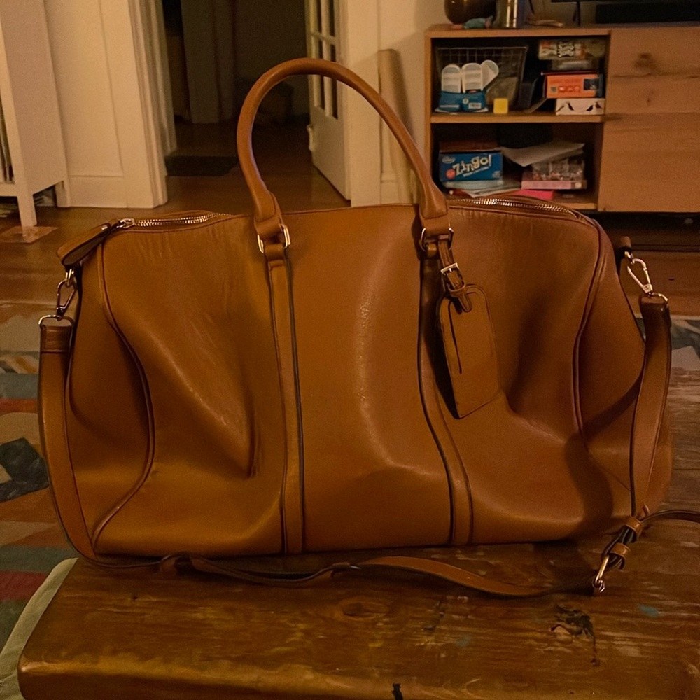 Hardly used day bag. Leopard print lining